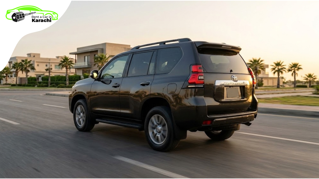Front three-quarter angle of a pristine Toyota Land Cruiser LC300 parked outside a luxury hotel in Clifton for SUV Rental Karachi by Rent a Car in Karachi.