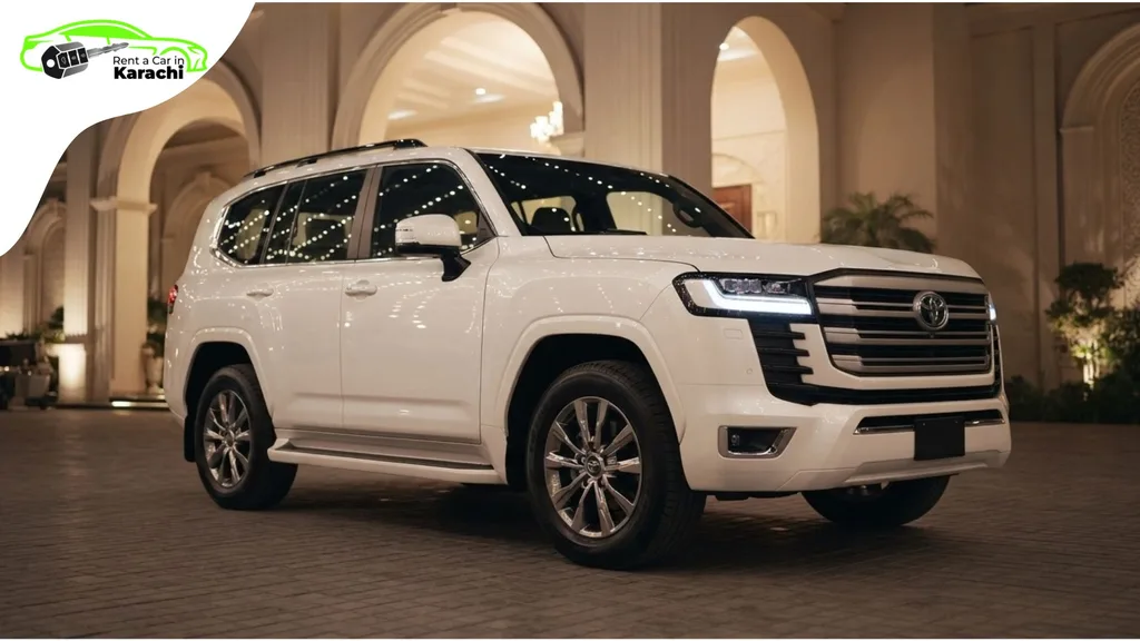 Pristine white Toyota Land Cruiser LC300 parked outside a luxury wedding venue in DHA Karachi for a premium Luxury Wedding Car Rental experience.